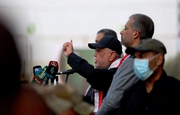 Fatah Alliance leader Hadi al-Ameri speaks at an election rally to promote his alliance in the southern Iraqi province of Maysan on October 6. The alliance, which comprises the largest Iran-affiliated groups, was defeated in the elections. [Fatah Alliance]