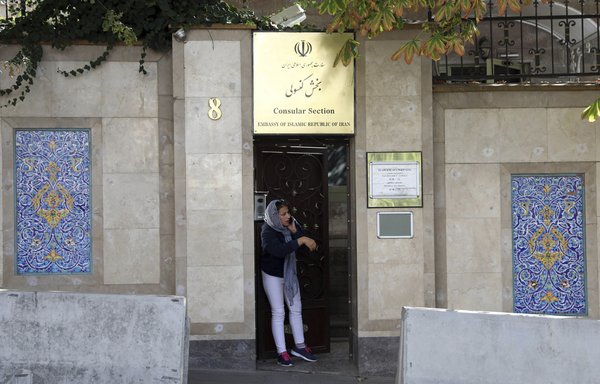 A person stands at the entrance of the Iranian embassy in Ankara, Turkey, October 15, 2018. [Adem Altan/AFP]