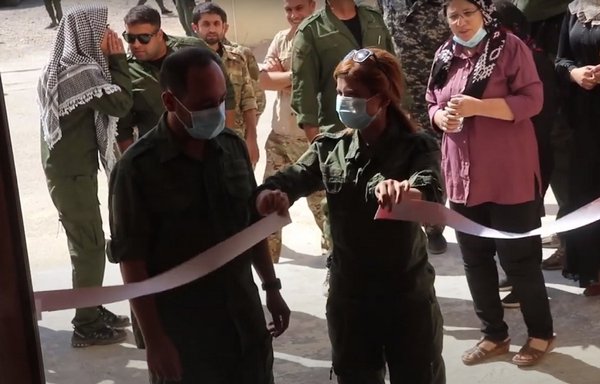 Officials inaugurate the General Centre for Women's Asayesh in Deir Ezzor on October 11. [Screenshot of ANHA News Agency video]