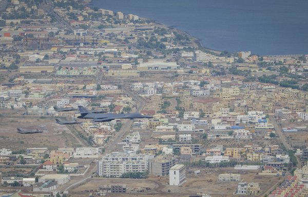 A US Air Force B-1B Lancer from Dyess Air Force Base, Texas, flies a bomber task force mission alongside two UK and two US F-35 Lightning IIs over Camp Lemonnier, Djibouti, on November 11. [US Air Force]