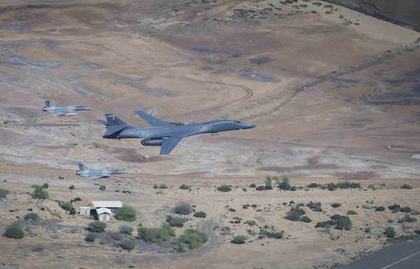 A US Air Force B-1B Lancer from Dyess Air Force Base, Texas, flies a bomber task force mission alongside two French Dassault Mirage 2000s, over Camp Lemonnier, Djibouti, on November 11. [US Air Force]