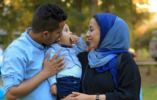 Yemeni journalist Rasha al-Harazi with her husband, Mahmoud al-Atmi, and their two-year-old son. Al-Harazi was killed along with her unborn child when a sticky bomb attached to her husband's car detonated as he drove her to hospital in Aden. [Ghadeer Tyrah/Twitter]