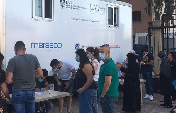 A team from the LAU Medical Centre takes part in a campaign to conduct PCR tests in the five governorates of Lebanon via a mobile clinic. [LAU]