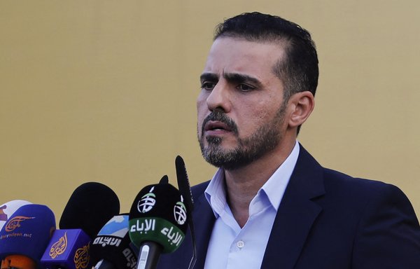 Abu Ali al-Askari, Kataib Hizbullah spokesman, speaks during a campaign rally in Baghdad on September 3, ahead of Iraq's upcoming parliamentary elections. [Ahmed al-Rubaye/AFP]