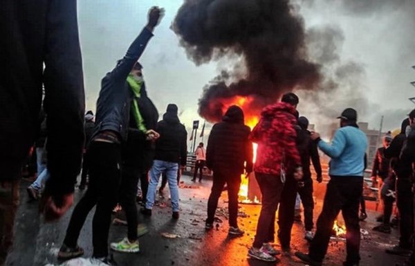 Protesters in Tehran take part in a nationwide outpouring of anger in November 2019 over a steep increase in the price of gasoline. [Fars News]