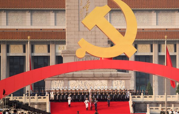 Chinese honour guards stand in formation at the Monument to the People's Heroes before celebrations in Beijing on July 1 to mark the 100th anniversary of the founding of the Communist Party of China. [Wang Zhao/AFP]