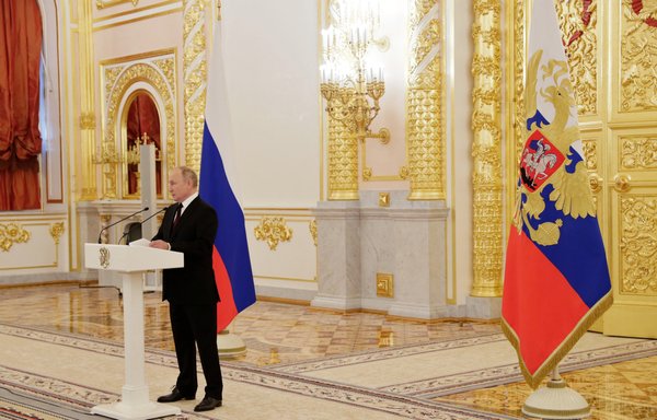 Russian President Vladimir Putin delivers a speech during a ceremony at the Kremlin on December 1. [Mikhail Metzel/Sputnik/AFP]