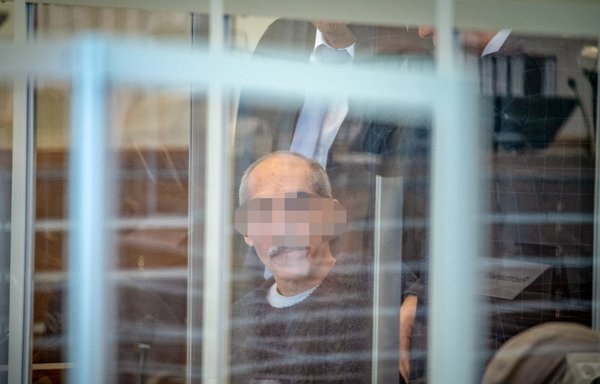 Syrian defendant Anwar Raslan arrives at court for an unprecedented trial on state-sponsored torture in Syria, on April 23, 2020, in Koblenz, western Germany. [Thomas Lohnes/AFP/Pool]