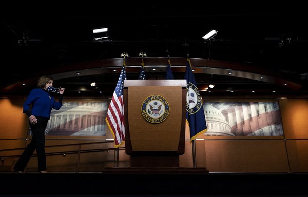 Speaker of the House Nancy Pelosi arrives for her weekly press conference on Capitol Hill in Washington, DC, on December 2. [Jim Watson/AFP]