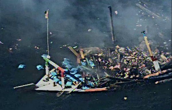 Debris from a sinking fishing vessel is seen in the Gulf of Oman on December 15, after US Navy personnel rescued five injured Iranians who had been transporting illicit drugs. [US Navy]