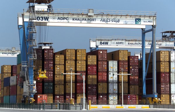 Containers are stacked at the Khalifa Port in Abu Dhabi in this file photo from September 1, 2012 -- the month commercial operations at the port began. [Karim Sahib/AFP]