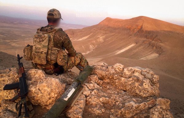 A Russian mercenary from the Wagner Group guards a hill overlooking the Syrian city of Palmyra. [File]