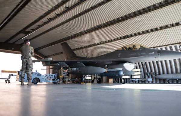Airmen from the 378th Air Expeditionary Wing conduct an integrated combat turn at King Fahad Air Base in Saudi Arabia, December 7. [CENTCOM]