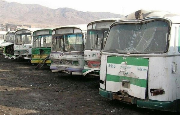 A number of out of commission public buses are seen in Tehran in an undated photo. [Tasnim]