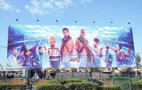 Hizbullah erected this huge billboard of the late IRGC commander Qassem Soleimani, emblazoned with the slogan 'We are Qassem', on the airport road in Beirut. [Ziad Hatem/Al-Mashareq]