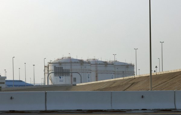 A picture shows a storage facility of oil giant ADNOC near the airport in Abu Dhabi on January 17. Three people were killed in an attack on the facility claimed by the Houthis that set off a blast and a fire. [AFP]