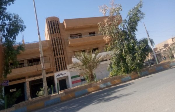 A photo shows the headquarters of IRGC-allied militias in the Syrian border town of Albu Kamal. [Albu Kamal Revolutionaries on Telegram-- @bukamalthoaar]