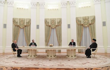 In Moscow, Raisi sells off China deal leftovers