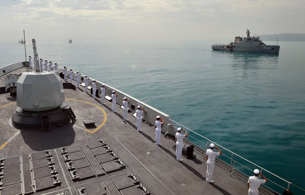 Chinese sailors aboard the guided-missile frigate saluting a Tunisian patrol vessel after crossing out of Egypt's Suez Canal. [Chinese Ministry of Defence]