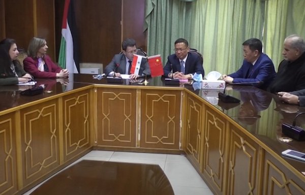 Syrian and Chinese officials take part in a signing ceremony on January 12, as Syria joins China's Belt and Road Initiative. [SANA News Agency]