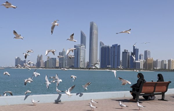 Seagulls fly across Abu Dhabi's seaside promenade in the Emirati capital on January 24. The United Arab Emirates has been the target of Iran-backed militias from Yemen and Iraq in recent weeks. [Karim Sahib/AFP]