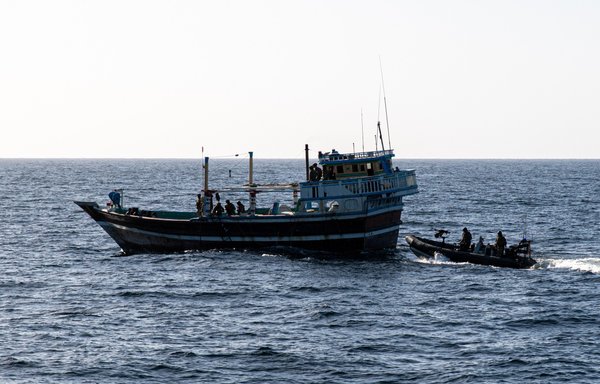 A Combined Maritime Forces (CMF) vessel can be seen during a raid on a smuggling boat in Gulf waters in January. [Combined Maritime Forces]