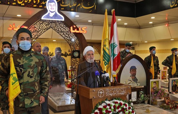 Hizbullah deputy Naim Qassem delivers a speech during a ceremony commemorating the party's fallen leaders in the Ghobeiry neighbourhood of southern Beirut on February 15. [Anwar Amro/AFP]