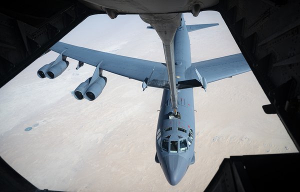 A US Air Force KC-10 Extender, deployed to Al-Dhafra air base in the UAE, prepares to refuel a B-52 above the US Central Command area of responsibility on February 14. [US Air Force]