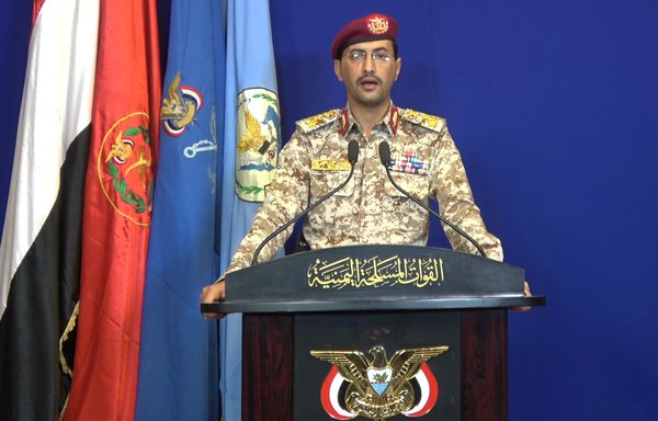 A screenshot taken from a video shows Houthi military spokesman Yahya Saree at a September 14, 2019, press conference, where his group claimed responsibility for drone attacks on Saudi Aramco's processing plants in Abqaiq and Khurais. [Al-Huthi Group Media Office/AFP]