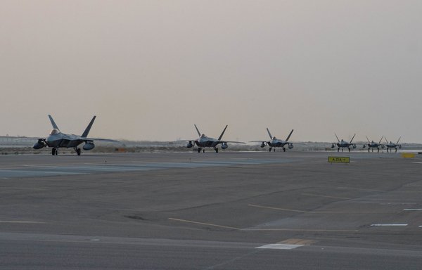 US Air Force F-22 Raptors arrive at al-Dhafra air base in the United Arab Emirates on February 12. [US Air Force]