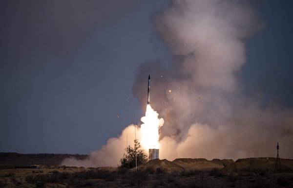 A rocket launches from an S-400 missile system at the Ashuluk military base in southern Russia on September 22, 2020. [Dimitar Dilkoff/AFP]