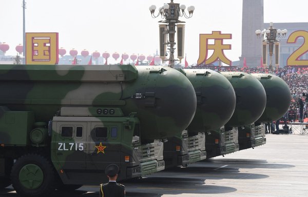 China's DF-41 nuclear-capable intercontinental ballistic missiles are seen during a military parade at Tiananmen Square in Beijing on October 1, 2019. The United States on March 30 sanctioned Iranian intermediaries smuggling ballistic missile parts from China. [Greg Baker/AFP]