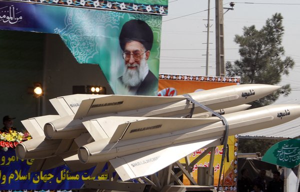 A military truck carries Shalamcheh missiles during an annual military parade in Tehran on September 22, 2013. [Atta Kenare/AFP]