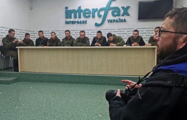 Russian prisoners of war are presented to the press by the Security Service of Ukraine (SBU) March 5 in Kyiv. Russia expected a swift conquest of Ukraine, but instead captured Russians are denouncing the commanders who lied to them about the war. [Daphne Rousseau/AFP]