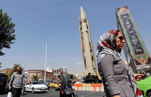 A Shahab-3 surface-to-surface missile is pictured on display in a street exhibition by Iran's army and the IRGC celebrating 'Defence Week' at Baharestan Square in Tehran, on September 26, 2019. [STR/AFP]