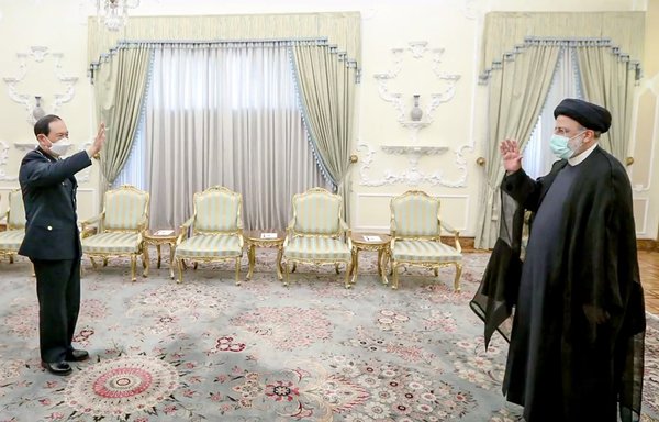 Iranian President Ebrahim Raisi (right) receives Chinese Defence Minister Wei Fenghe on April 27 in Tehran. [Iranian Ministry of Defence]