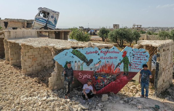 The American Coalition for Syria posted this picture on April 29 of Syrian Artist Aziz Asmar's mural in memory of the victims of the Tadamon massacre. [Omar Haj Kadour]