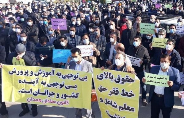 Teachers in Hamedan, Iran, gather to protest low pay and undesirable work conditions on May 1. [Iran International]