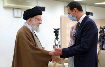 Khamenei lauds al-Assad as new war crimes come to light