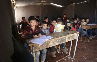 Displaced Syrian children bear brunt of war's psychological, physical impact