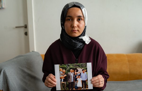 Uighur rights activist Nursimangul Abdureshid poses during an interview with AFP in Istanbul on March 12. Abdureshid left China to study in Turkey in 2013, lost contact with her parents and brothers in 2018, and has been struggling to find the whereabouts of her family members ever since. [Yasin Akgul/AFP]