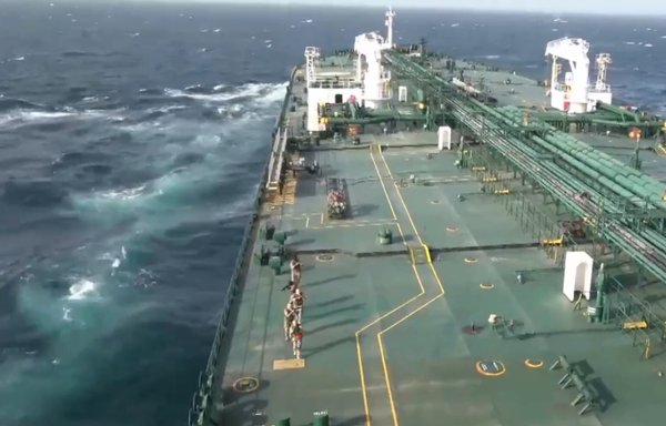 Armed members of the IRGC are seen here after they landed a helicopter on the Greek tanker to seize it. [Iranian Ministry of Defence]