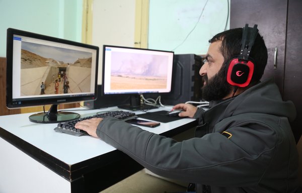 Syrian activist Omar al-Alewi, who was displaced from Abtin in southern rural Aleppo to Idlib in 2015, has no other means but the internet to follow the movement of Hizbullah and IRGC elements across his private property. [Ali Hajj Suleiman]