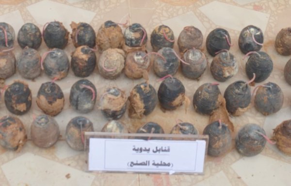 The Egyptian army displays homemade bombs confiscated from extremist elements on the Sinai peninsula May 29. [Official page of the Egyptian Armed Forces spokesman]