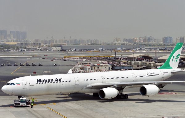A picture taken on September 14, 2017, shows a Mahan Air Airbus at Dubai International Airport. [Giuseppe Cacace/AFP]