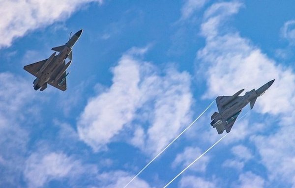 Two Chinese fighter jets take part in an exercise in March. [Chinese Ministry of Defence]