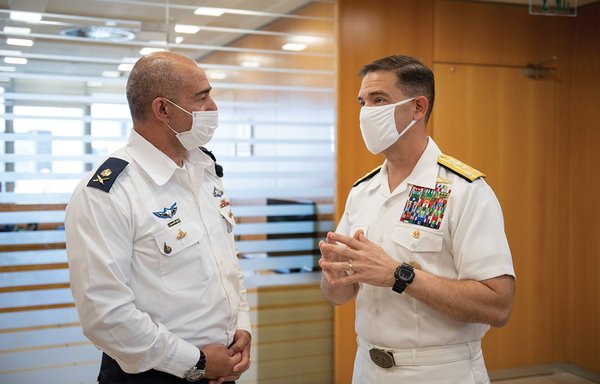 Vice Adm. Brad Cooper (right) speaks with Vice Adm. David Saar Salama, commander-in-chief of the Israeli Navy, in October. [US Navy]
