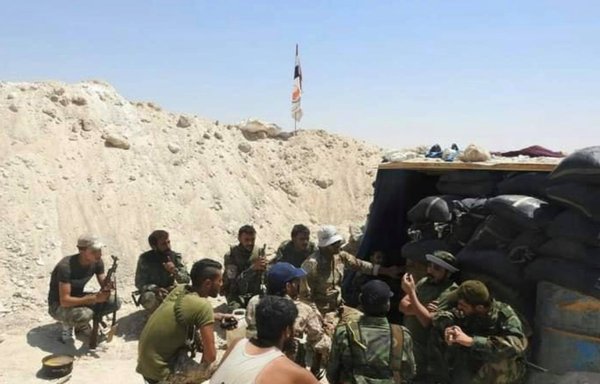 National Defence Forces militiamen are seen here in rural Deir Ezzor in a photo the militia posted online on December 31, 2020.