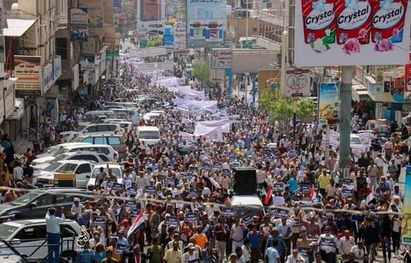 Yemeni protesters gather in the streets of Taez on May 25 to demand that the Houthis reopen the roads in their province, in a photo circulated on social media.