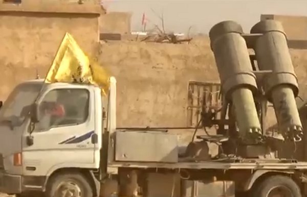 Medium-range missiles used by the Fatemiyoun Division are seen here in Syria in a video posted on June 2. [Screenshot from a video posted on the Fatemiyoun Telegram account]